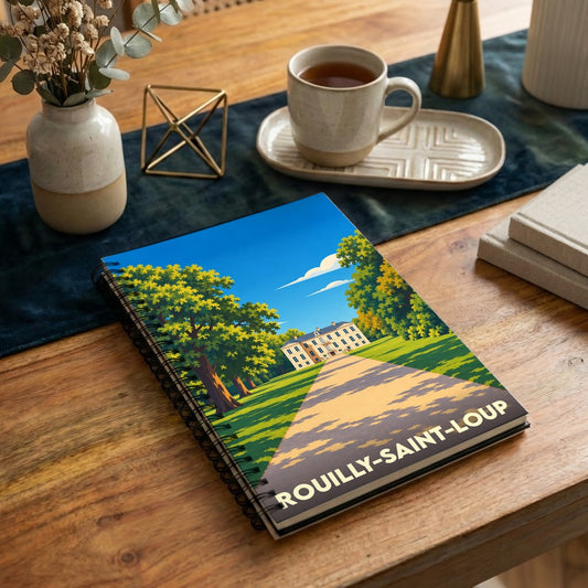 Carnet souvenir de la ville de Rouilly-Saint-Loup avec une illustration stylisée d'un château.