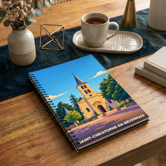 Carnet à spirale souvenir de Saint-Christophe-en-Brionnais avec une illustration stylisée de son église.