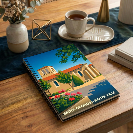 Carnet souvenir de la ville de Saint-Georges-Haute-Ville avec une illustration stylisée de son église sous un ciel bleu.