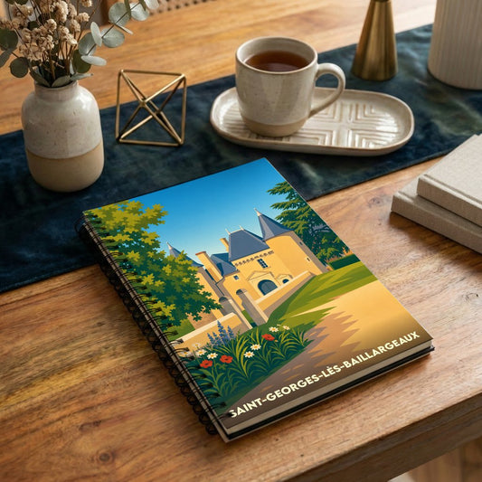 Carnet de notes souvenir de la ville de Saint-Georges-lès-Baillargeaux avec une illustration stylisée d'un château.
