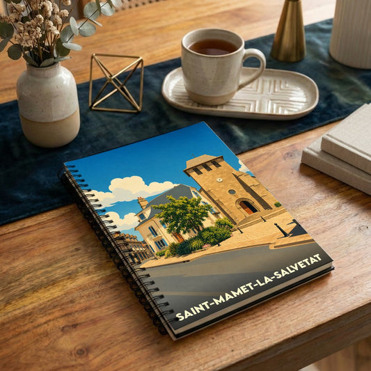 Carnet souvenir de la ville de Saint-Mamet-la-Salvetat avec une illustration stylisée de son église et de sa place.