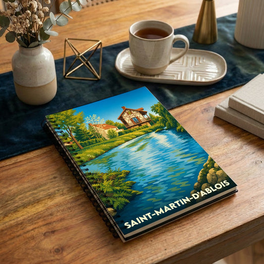 Carnet souvenir de la ville de Saint-Martin-d'Ablois avec une illustration stylisée de bord de l'eau.