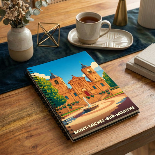 Carnet souvenir de la ville de Saint-Michel-sur-Meurthe avec une illustration stylisée de son église et d'une fontaine.
