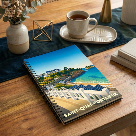 Carnet à spirales souvenir de la ville de Saint-Quay-Portrieux avec une illustration côtière stylisée.