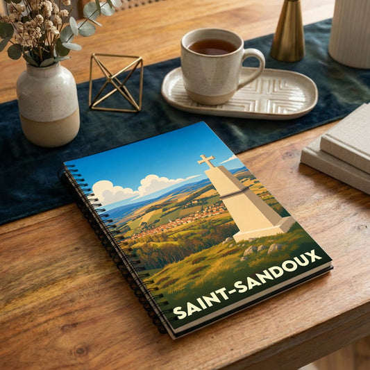 Carnet souvenir de la ville de Saint-Sandoux orné d'une illustration stylisée représentant un monument surplombant la commune.