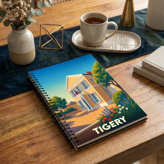 Carnet à spirales souvenir de la ville de Tigery avec une illustration stylisée de sa mairie.