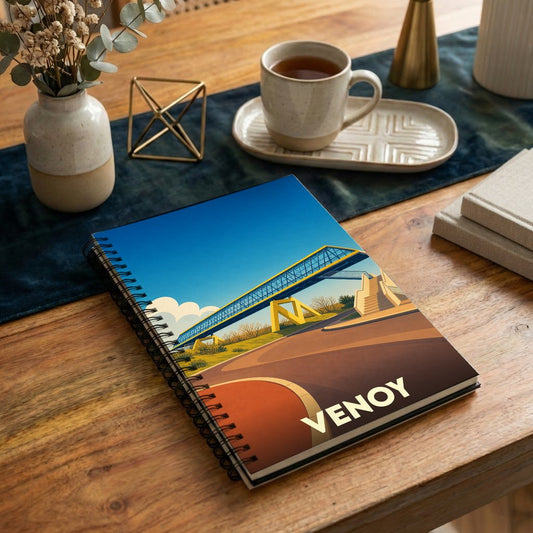 Carnet souvenir de la ville de Venoy orné d'une illustration stylisée d'un pont moderne.