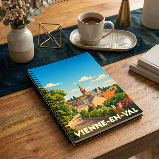 Carnet à spirales souvenir de la ville de Vienne-en-Val avec une illustration stylisée.
