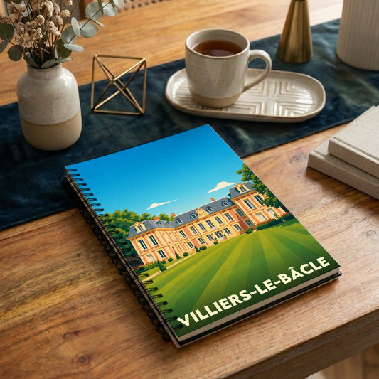 Carnet à spirales souvenir de la ville de Villiers-le-Bâcle avec une illustration stylisée de son château.