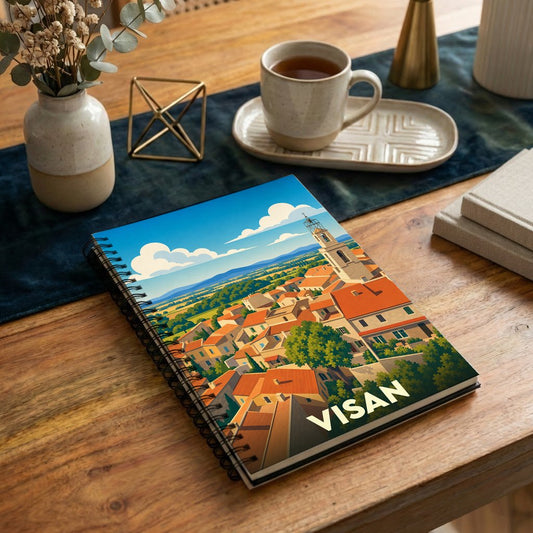 Carnet à spirale souvenir de la ville de Visan illustré d'un paysage urbain stylisé.