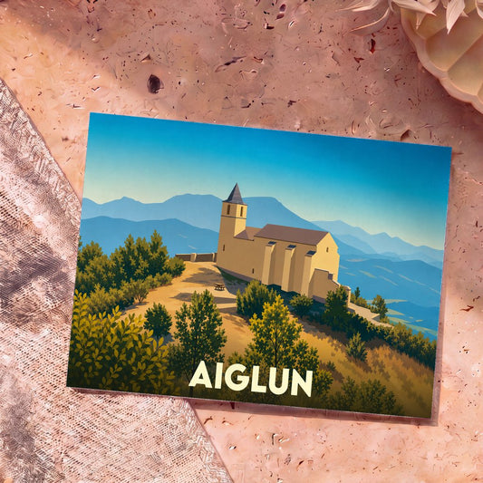 Carte postale souvenir de la ville de Aiglun avec une illustration stylisée montrant son église perchée sur une colline.