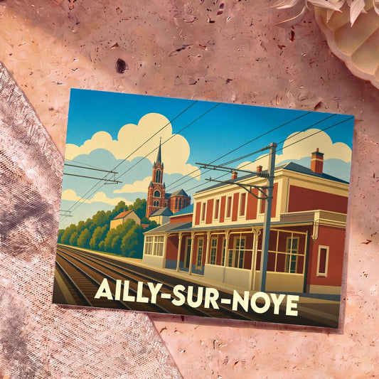 Carte postale souvenir de la ville d'Ailly-sur-Noye avec une illustration stylisée de sa gare et de son église.