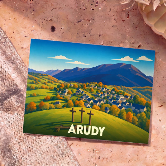 Carte postale souvenir de la ville de Arudy avec une illustration stylisée d'un village de montagne et trois croix au premier plan.