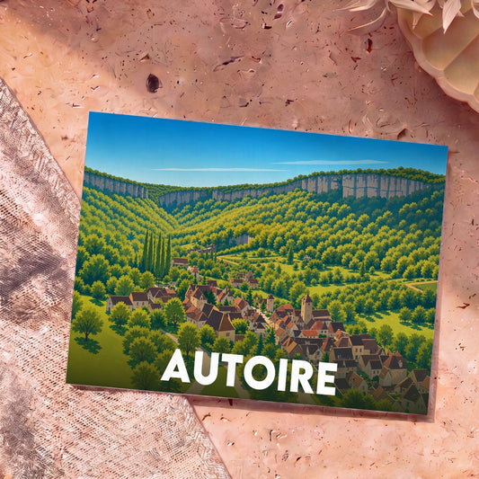 Carte postale souvenir de la ville d'Autoire avec une illustration stylisée d'un village niché dans une vallée verdoyante au pied de falaises.