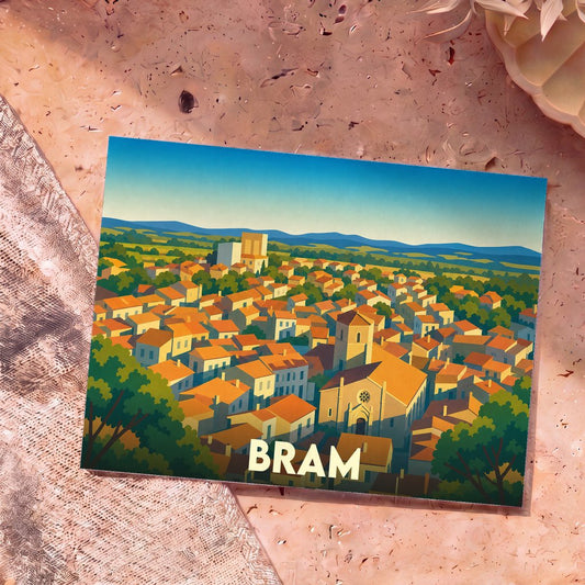 Carte postale souvenir de la ville de Bram avec une illustration stylisée de ses toits orangés.