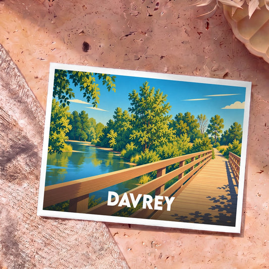 Carte postale souvenir de la ville de Davrey illustrant un pont en bois au-dessus d'une rivière calme.