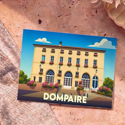 Carte postale souvenir de la ville de Dompaire illustrant un grand bâtiment fleuri sous un ciel bleu.