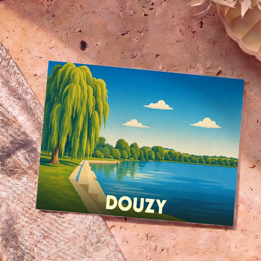 Carte postale souvenir de la ville de Douzy avec une illustration stylisée d'un saule pleureur au bord d'un lac.