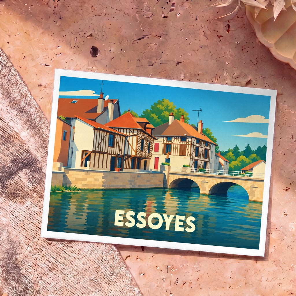 Carte postale souvenir de la ville d'Essoyes illustrant ses maisons à colombages au bord de l'eau.