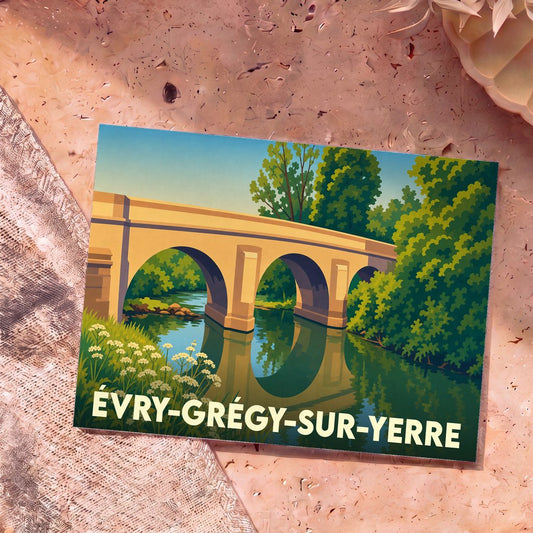 Carte postale souvenir de la ville d'Évry-Grégy-sur-Yerre avec une illustration stylisée d'un pont en pierre.
