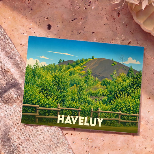 Carte postale souvenir de la ville de Haveluy illustrant un paysage de terril arboré avec un style graphique épuré.
