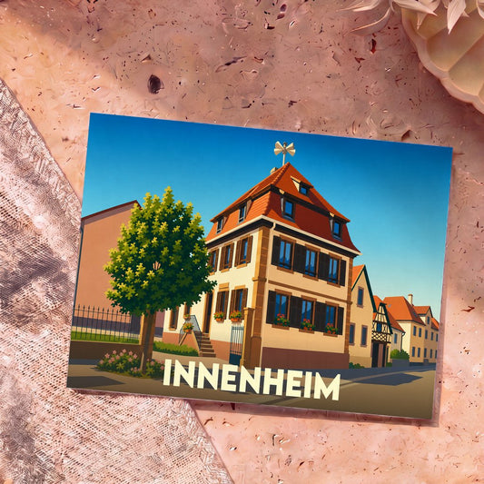 Carte postale souvenir de la ville de Innenheim présentant une illustration stylisée de son architecture traditionnelle.