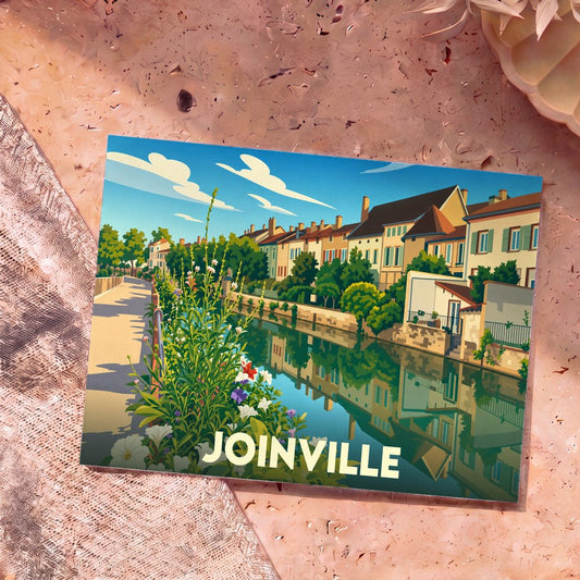 Carte postale souvenir de la ville de Joinville avec une illustration stylisée d'un canal bordé de maisons colorées.