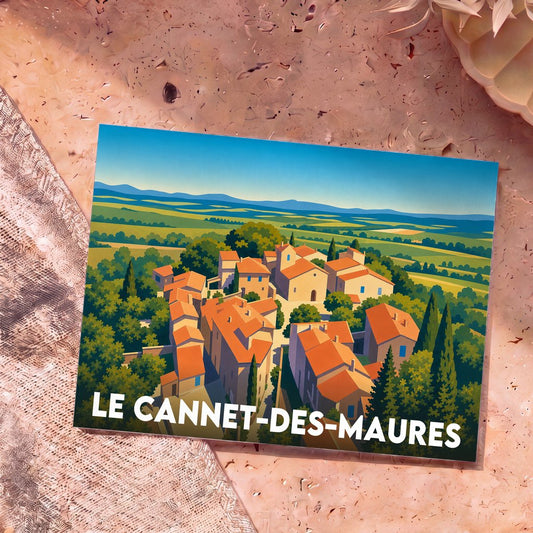 Carte postale souvenir de la ville de Le Cannet-des-Maures avec une illustration stylisée d'un village provençal.
