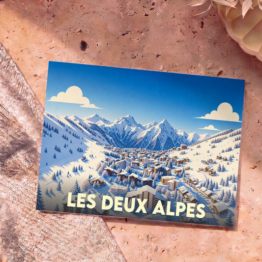 Carte postale souvenir de la ville de Les Deux Alpes illustrant une station de ski enneigée.