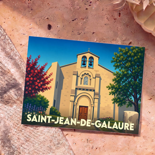 Carte postale souvenir de Saint-Jean-de-Galaure avec une illustration stylisée de son église sous un ciel bleu.