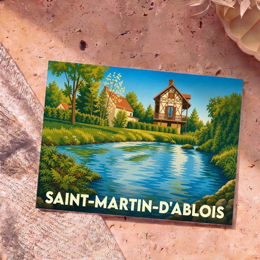 Carte postale souvenir de la ville de Saint-Martin-d'Ablois illustrant un paysage paisible avec une maison à colombages au bord de l'eau.