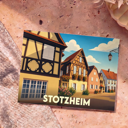 Carte postale souvenir de la ville de Stotzheim avec une illustration stylisée de maisons à colombages.
