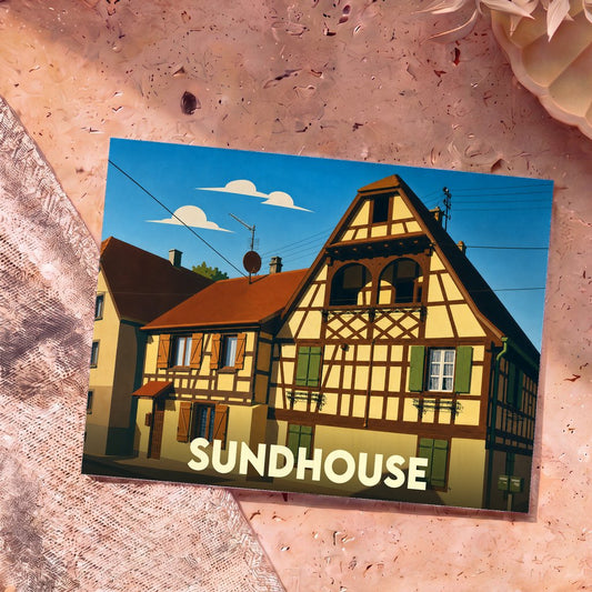 Carte postale souvenir de la ville de Sundhouse avec une illustration stylisée de maisons à colombages.