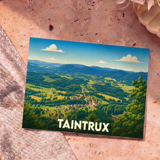 Carte postale souvenir de la ville de Taintrux illustrant un paysage de vallée verdoyante et montagneuse.