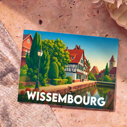 Carte postale souvenir de la ville de Wissembourg illustrant une scène pittoresque au bord de l'eau.