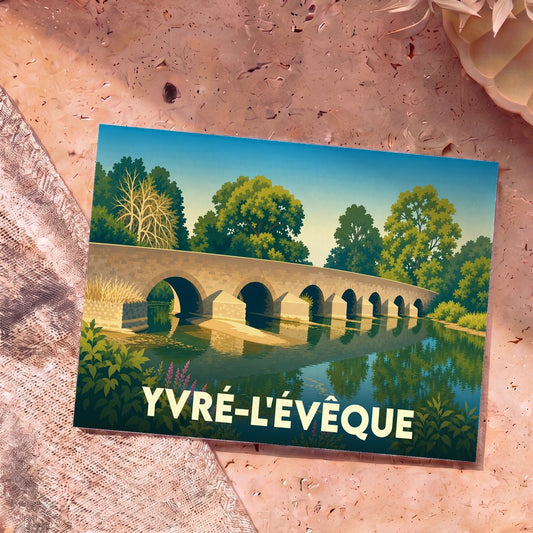 Carte postale souvenir de la ville d'Yvré-l'Évêque illustrant un pont de pierre traversant une rivière calme bordée de végétation.