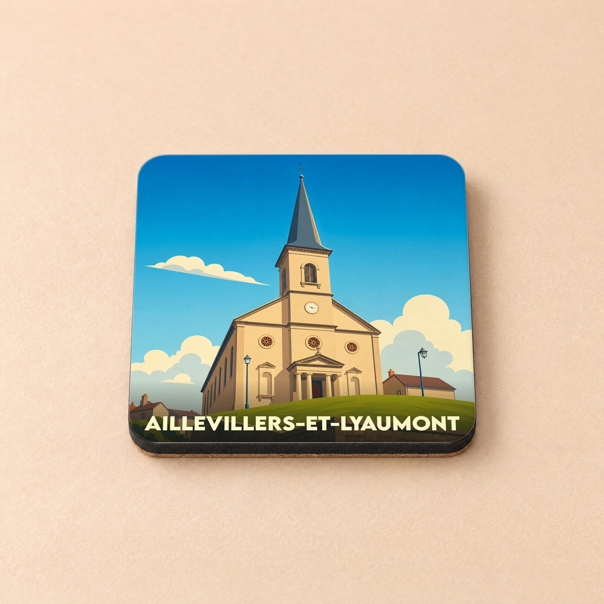Dessous de verre souvenir de la ville de Aillevillers-et-Lyaumont illustrant son église dans un style épuré.