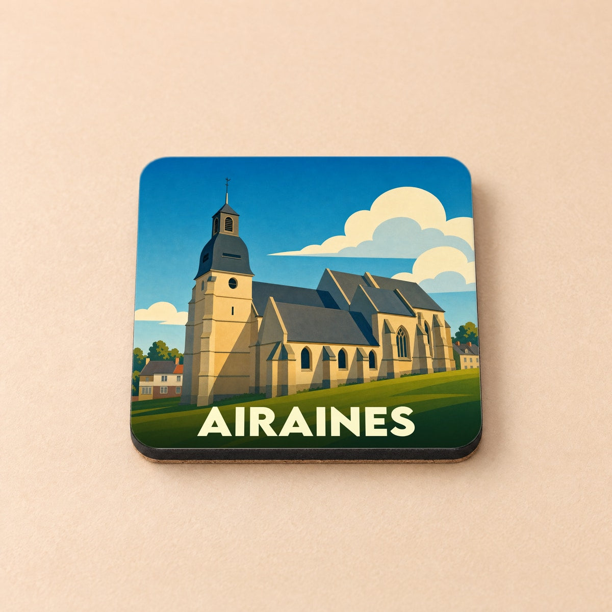 Dessous de verre souvenir de la ville d'Airaines avec une illustration stylisée de son église.