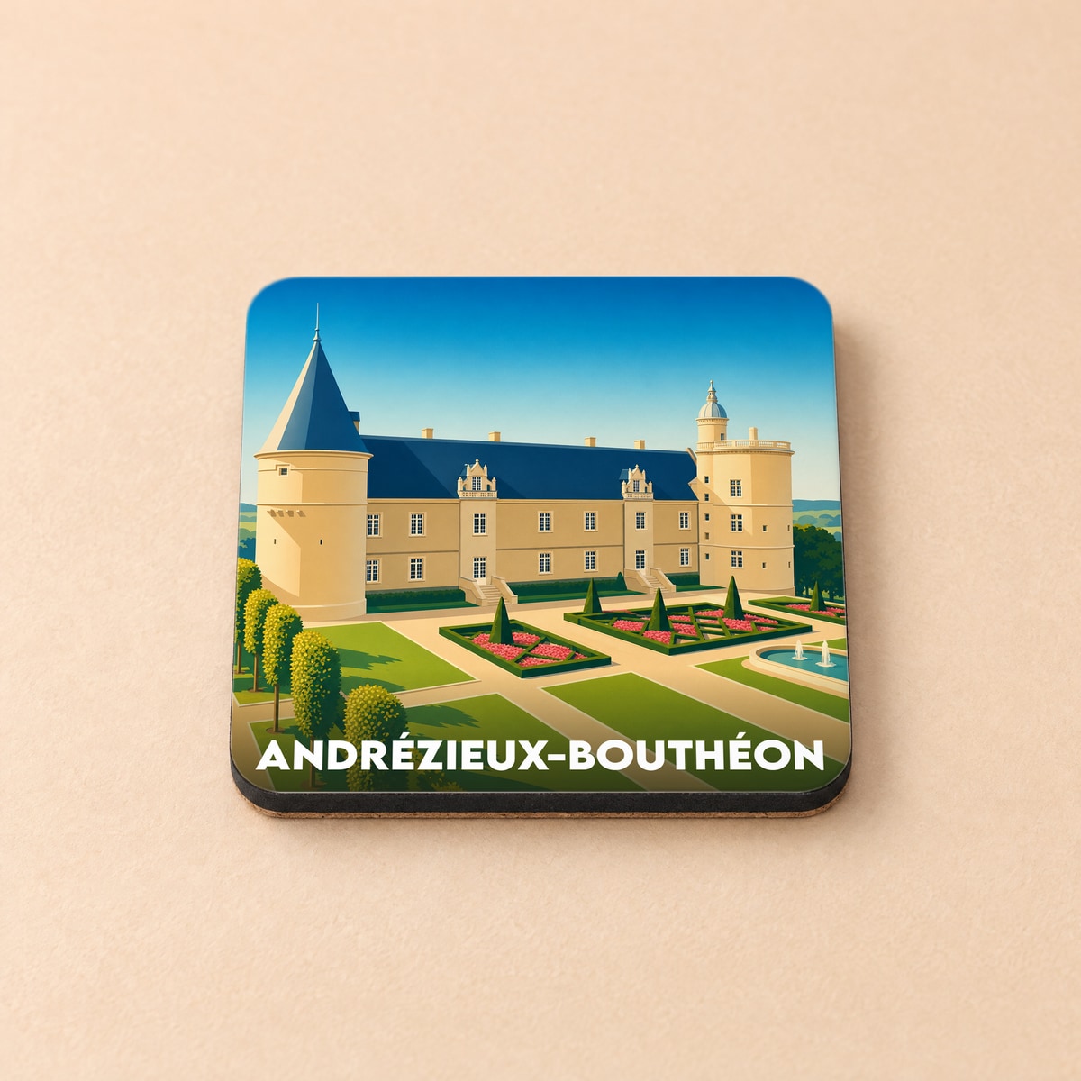 Dessous de verre souvenir de la ville d'Andrézieux-Bouthéon illustré par son château et ses jardins stylisés.