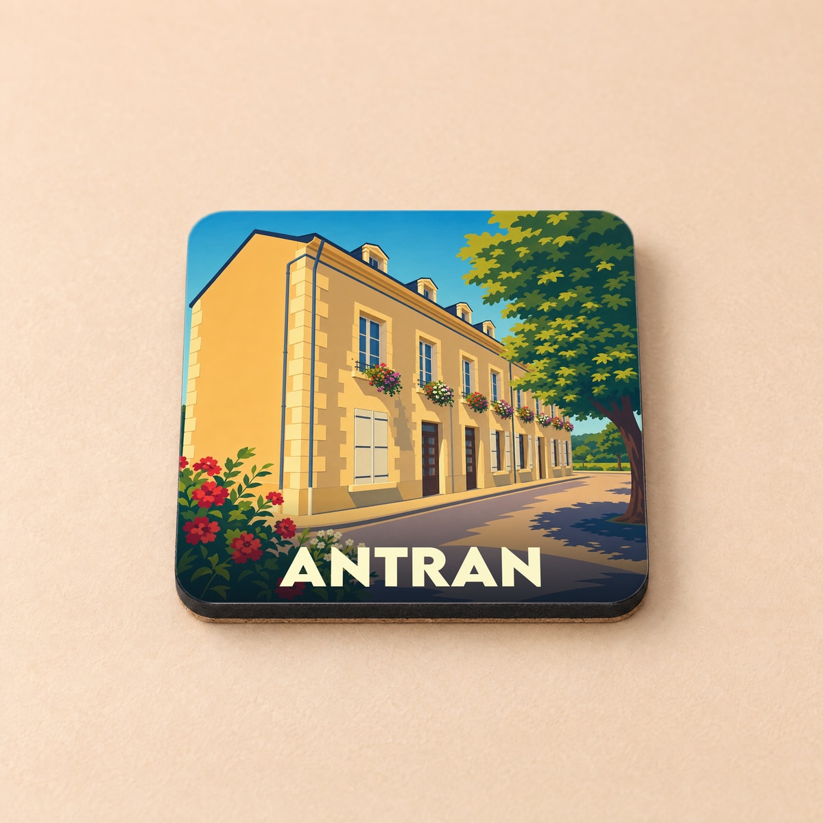 Dessous de verre souvenir de la ville d'Antran avec une illustration stylisée d'un bâtiment fleuri.