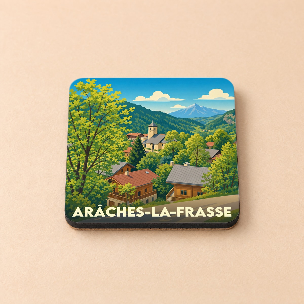 Dessous de verre souvenir de la ville d'Arâches-la-Frasse avec une illustration stylisée de montagne.