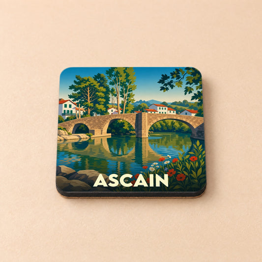 Dessous de verre souvenir de la ville d'Ascain avec une illustration stylisée de son pont romain.