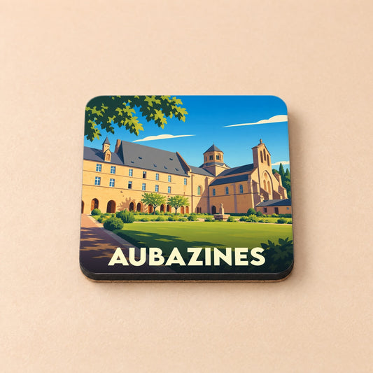Dessous de verre souvenir de la ville d'Aubazines avec une illustration stylisée de son abbaye.