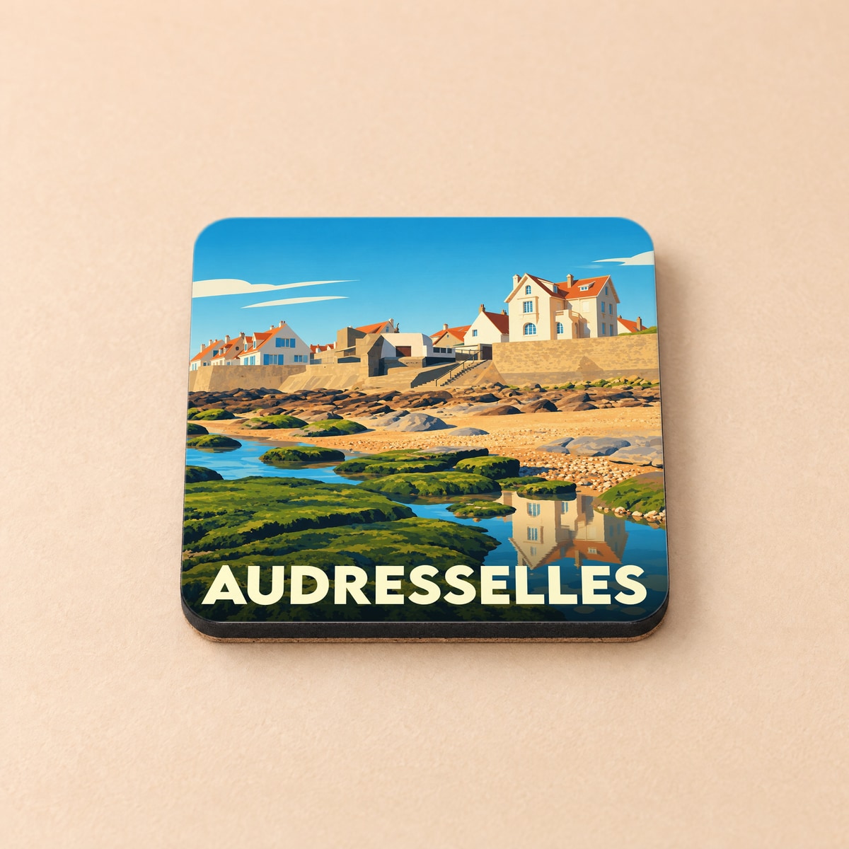 Dessous de verre souvenir de la ville d'Audresselles avec une illustration stylisée de son front de mer.
