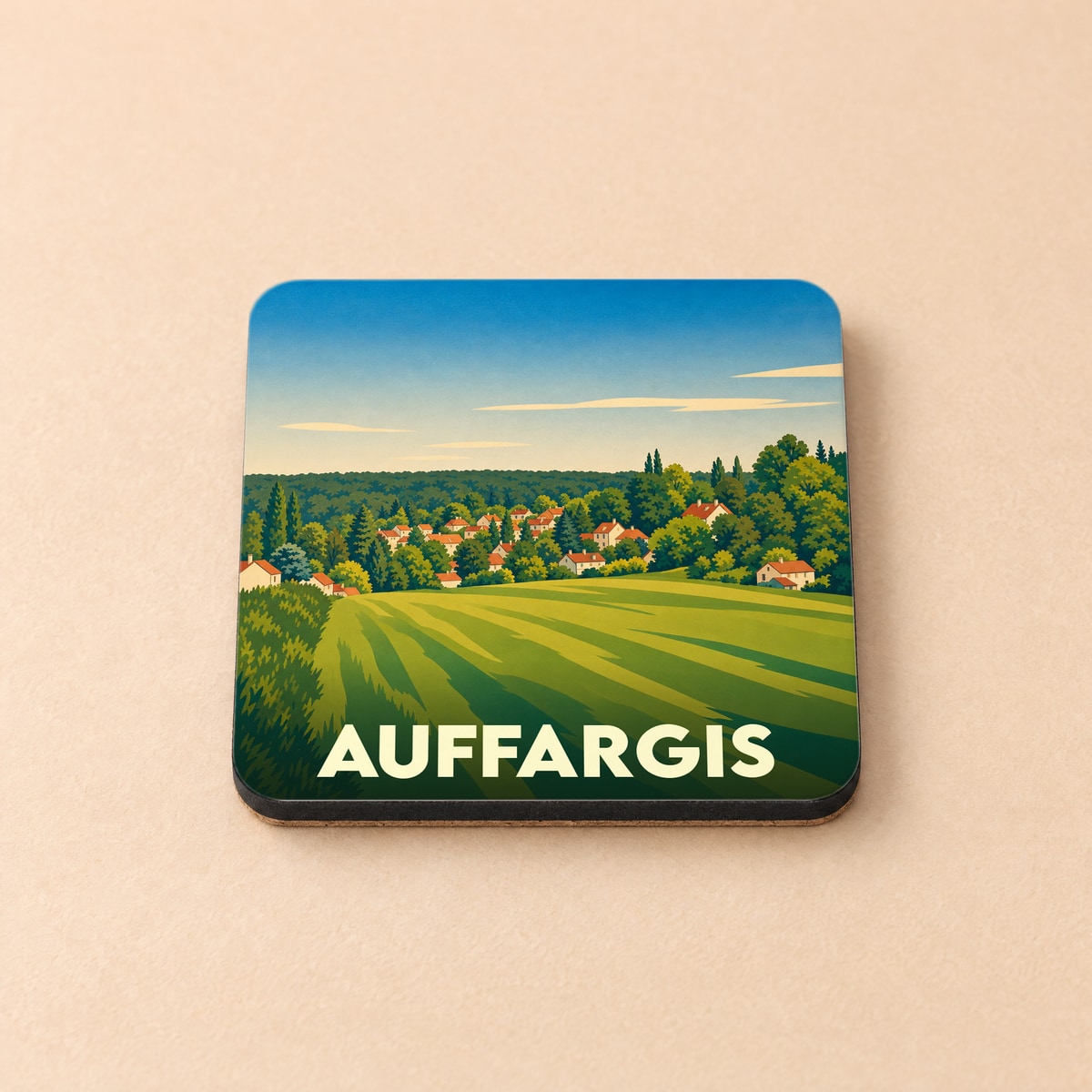 Dessous de verre souvenir de la ville d'Auffargis avec une illustration stylisée de son paysage vallonné.