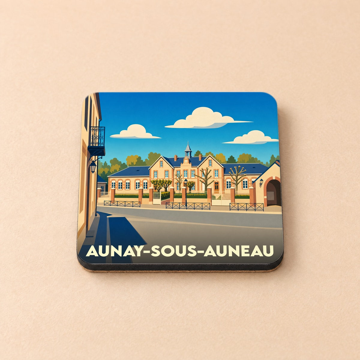 Dessous de verre souvenir de la ville d'Aunay-sous-Auneau avec une illustration stylisée de sa mairie.