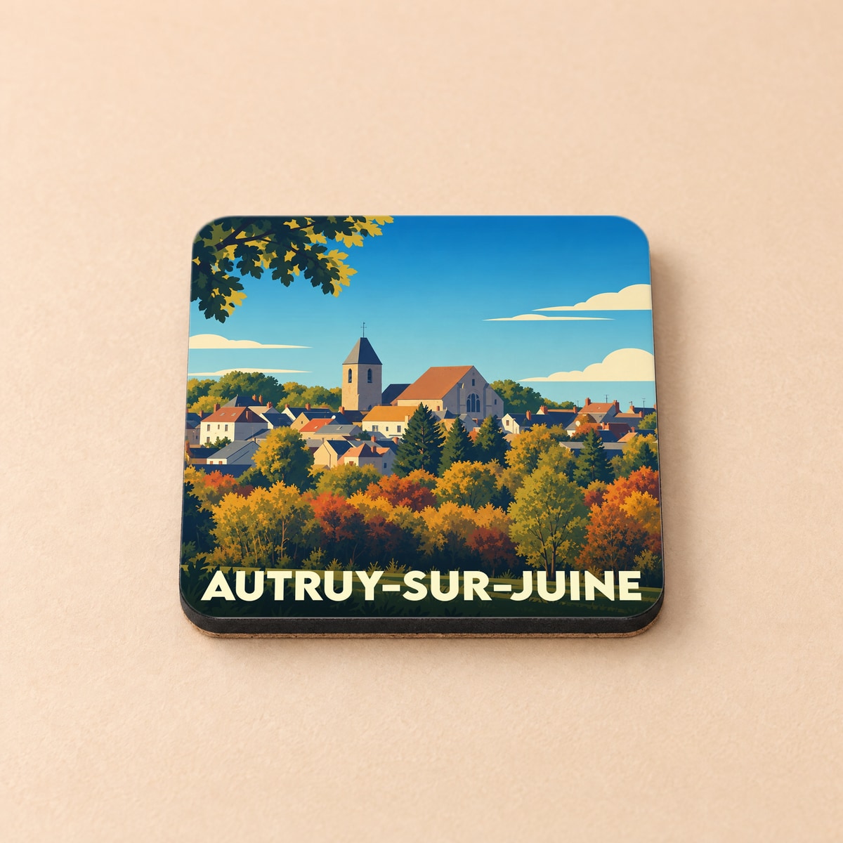 Dessous de verre souvenir de la ville d'Autruy-sur-Juine avec une illustration automnale stylisée.