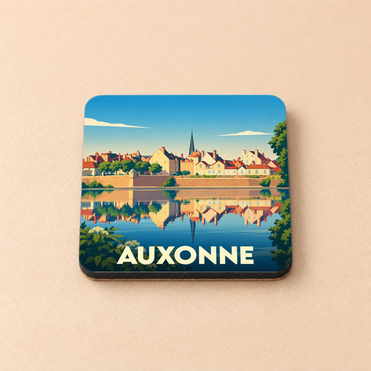 Dessous de verre souvenir de la ville de Auxonne avec une illustration stylisée d'un paysage urbain se reflétant dans l'eau.