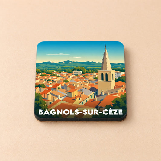 Dessous de verre souvenir de la ville de Bagnols-sur-Cèze avec une illustration stylisée de ses toits et de son clocher.