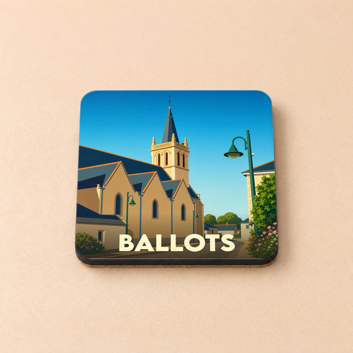 Dessous de verre souvenir de la ville de Ballots avec une illustration stylisée de son église.